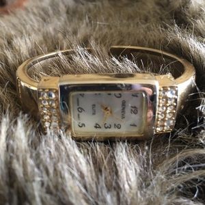 Ladies Geneva Elite gold tone rhinestone watch